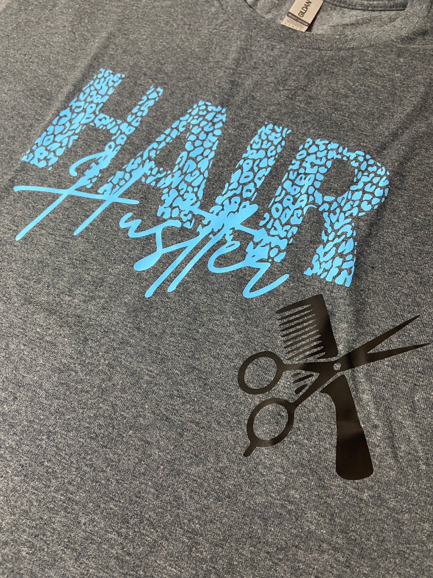 (A) Hair Hustler t-shirt