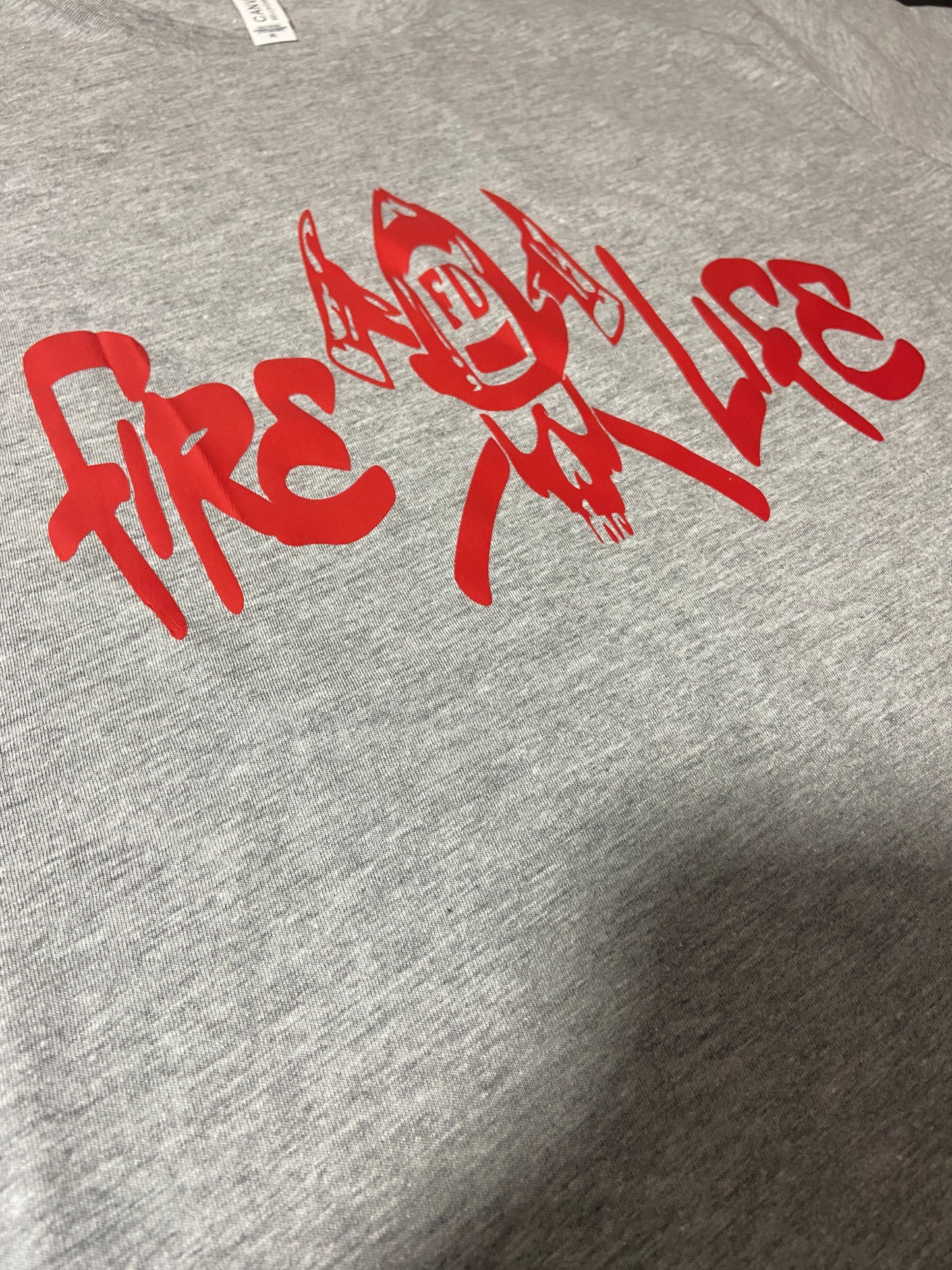 (A) Fire Life t-shirt