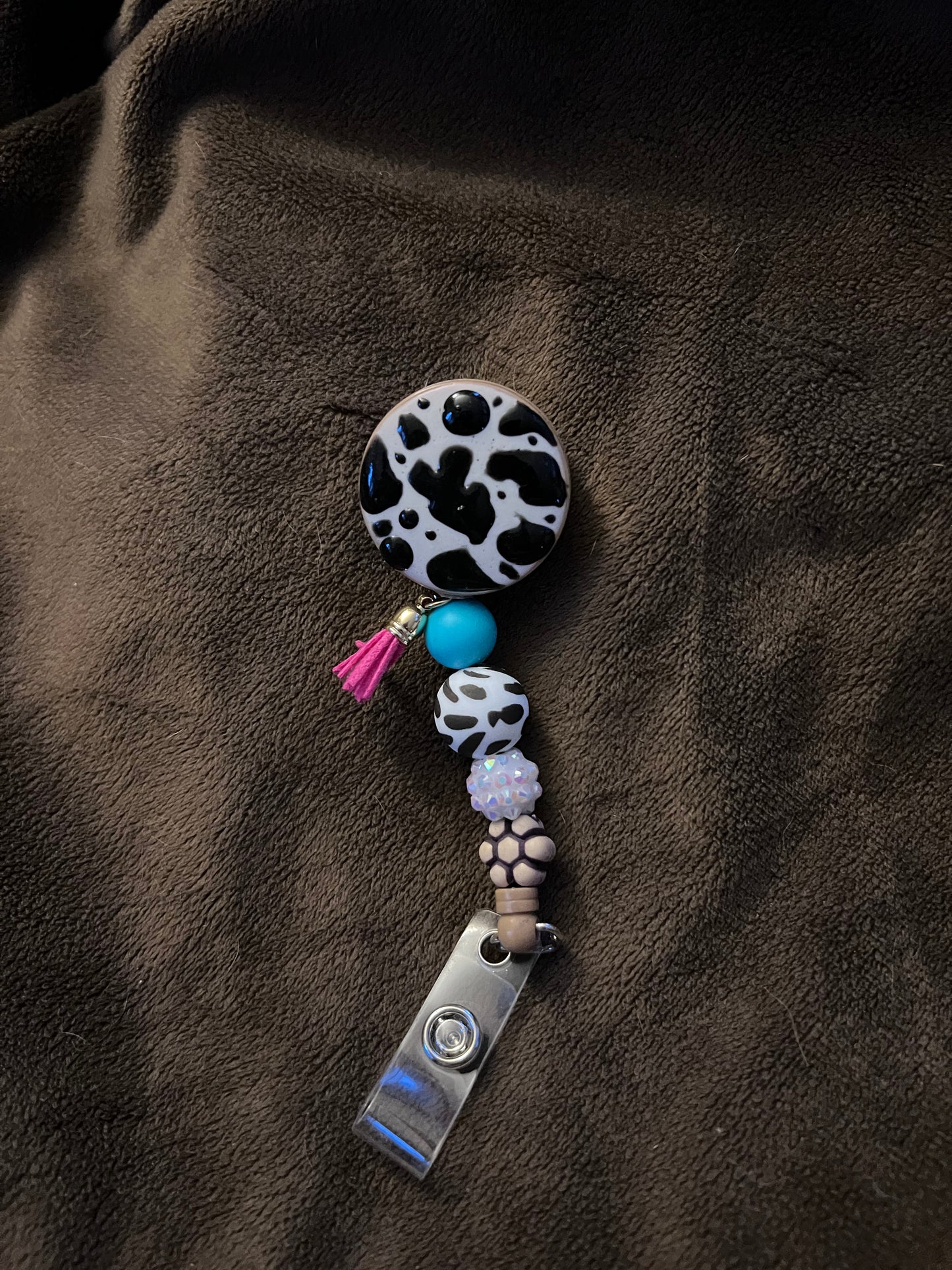 (G) Cow print badge reel