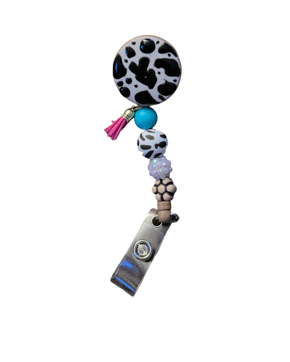 (G) Cow print badge reel